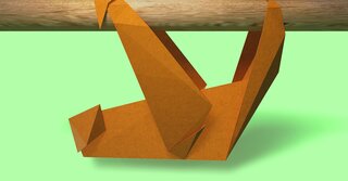 Origami sloth on a bright green background