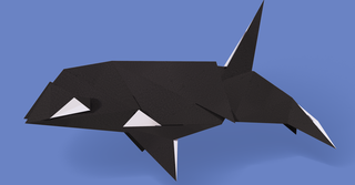 image of an orca in origami style