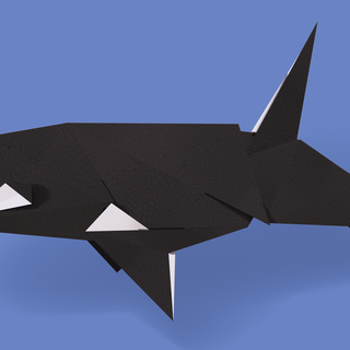 image of an orca in origami style
