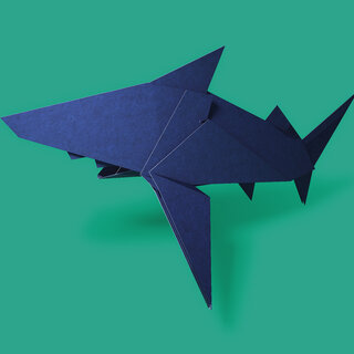 image of a shark in origami style