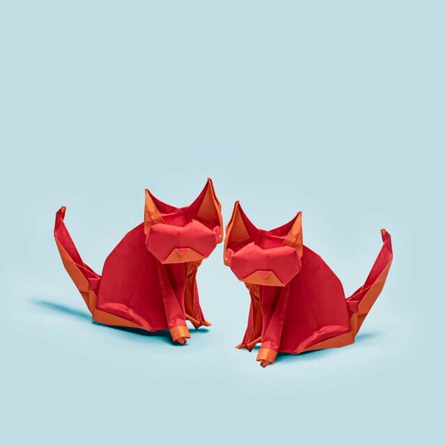 Origrami of two red kittens