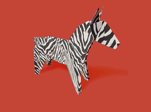 Origami zebra on red background