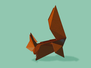 Origami squirrel on a mint-colored background