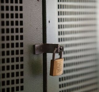 Image of a lock hanging on a door